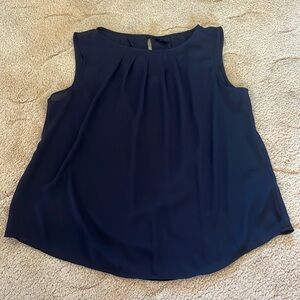 Worthington size large black semi-sheer blouse with little button on the back